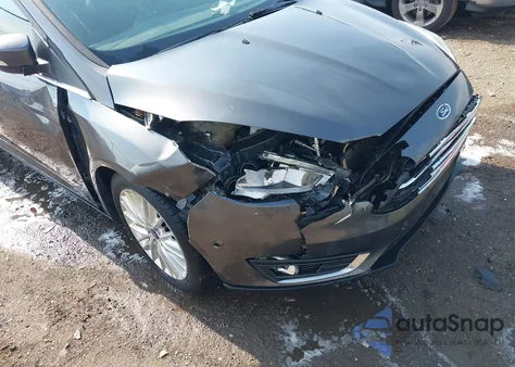 2017 Ford Focus Titanium from USA, damaged, VIN 1FADP3J21HL203736